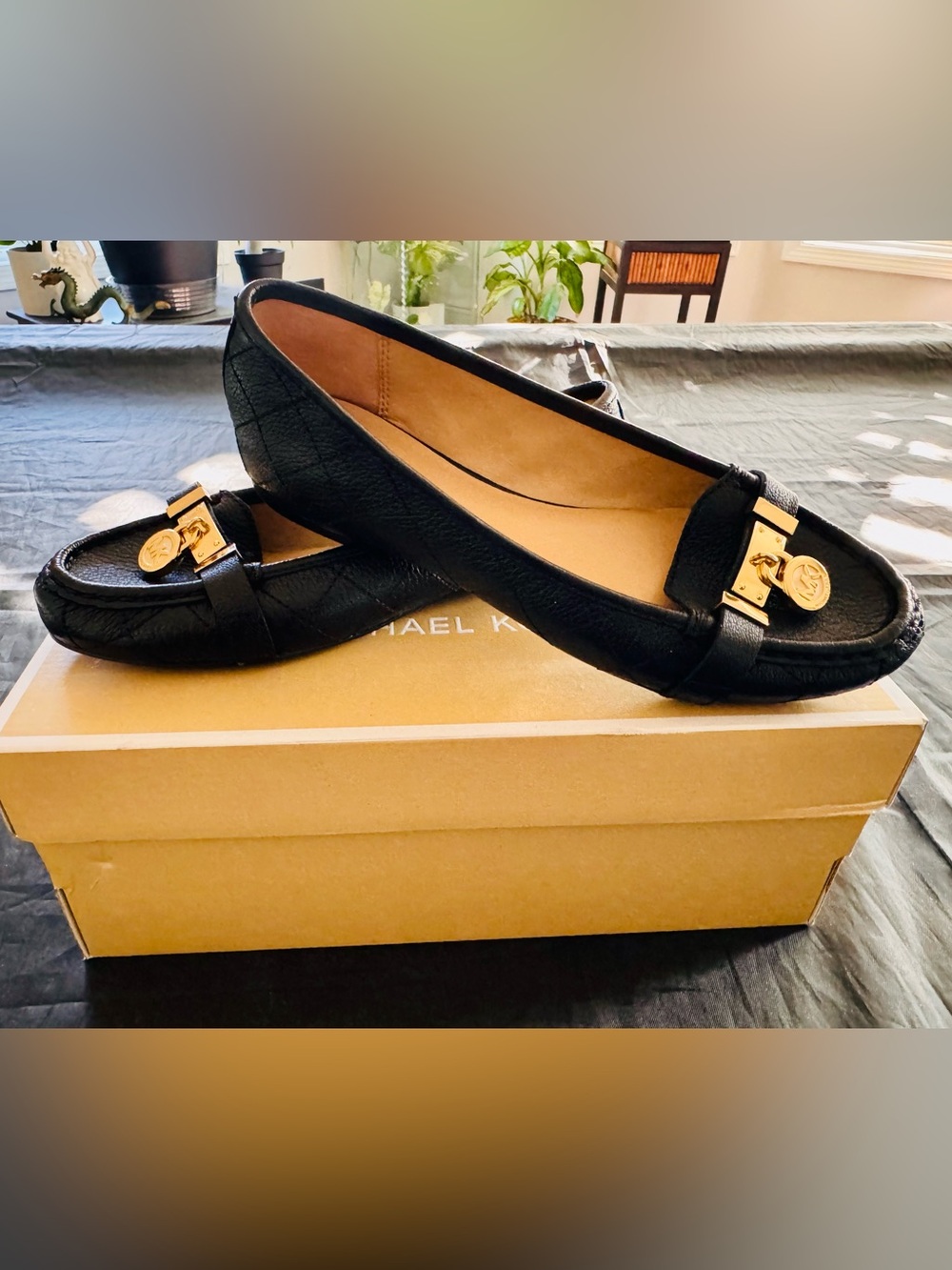 Michael Kors Black Leather Flat with Gold Buckle Accent